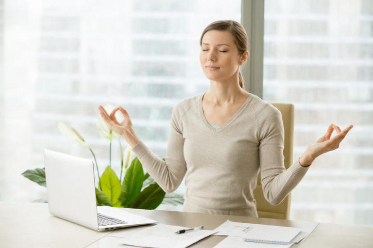 Woman doing breathing exercise