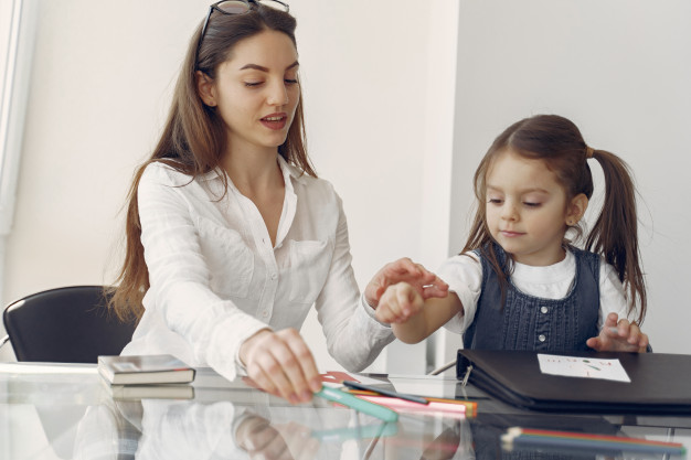 An educational psychologist helping a child