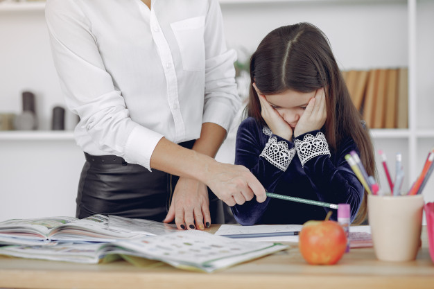 Educational Psychologist comforting a child